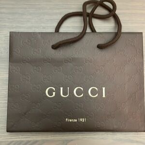 NEW Authentic Gucci gift bag approximately 6.75x9 inches.